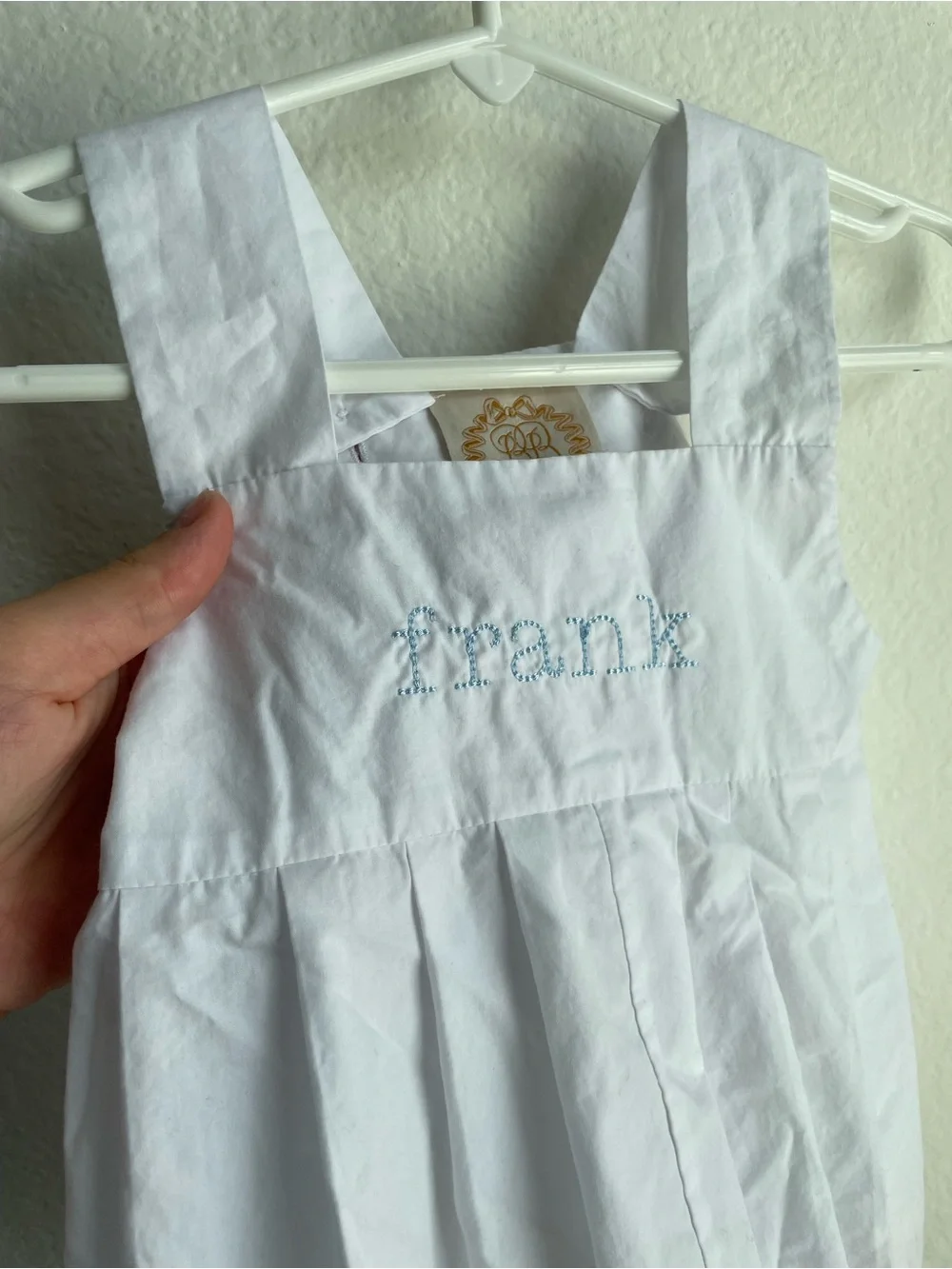 The Beaufort Bonnet Company white bubble outfit embroidered “Frank”